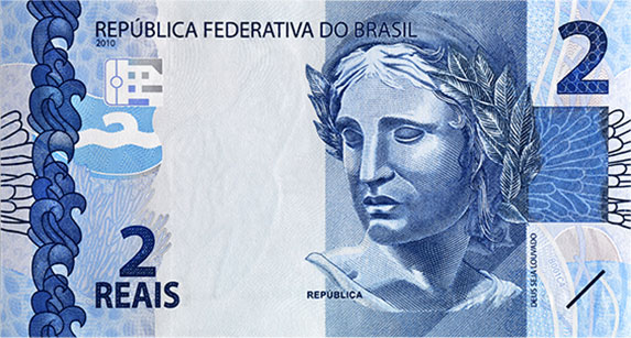 Notas do Real Brasileiro e Notas de hum Dólar dos Estados Unidos. Conceitos  de economia brasileira, câmbio e inflação. Stock Photo